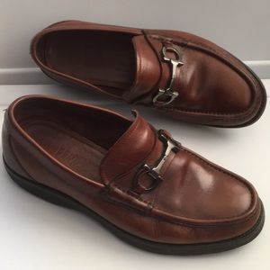 Salvatore Ferragamo Florence Italy leather horse bite buckled slip on loafers